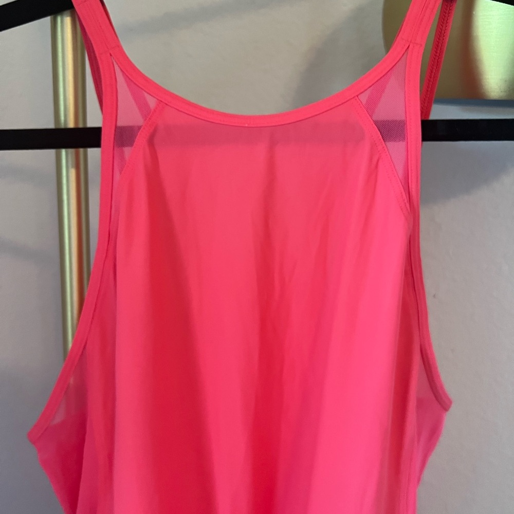 Lululemon workout top size 4.  Pink/salmon color - Picture 5 of 6